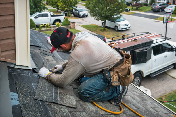 Professional Roof Replacement technician working in Golden's Bridge, NY